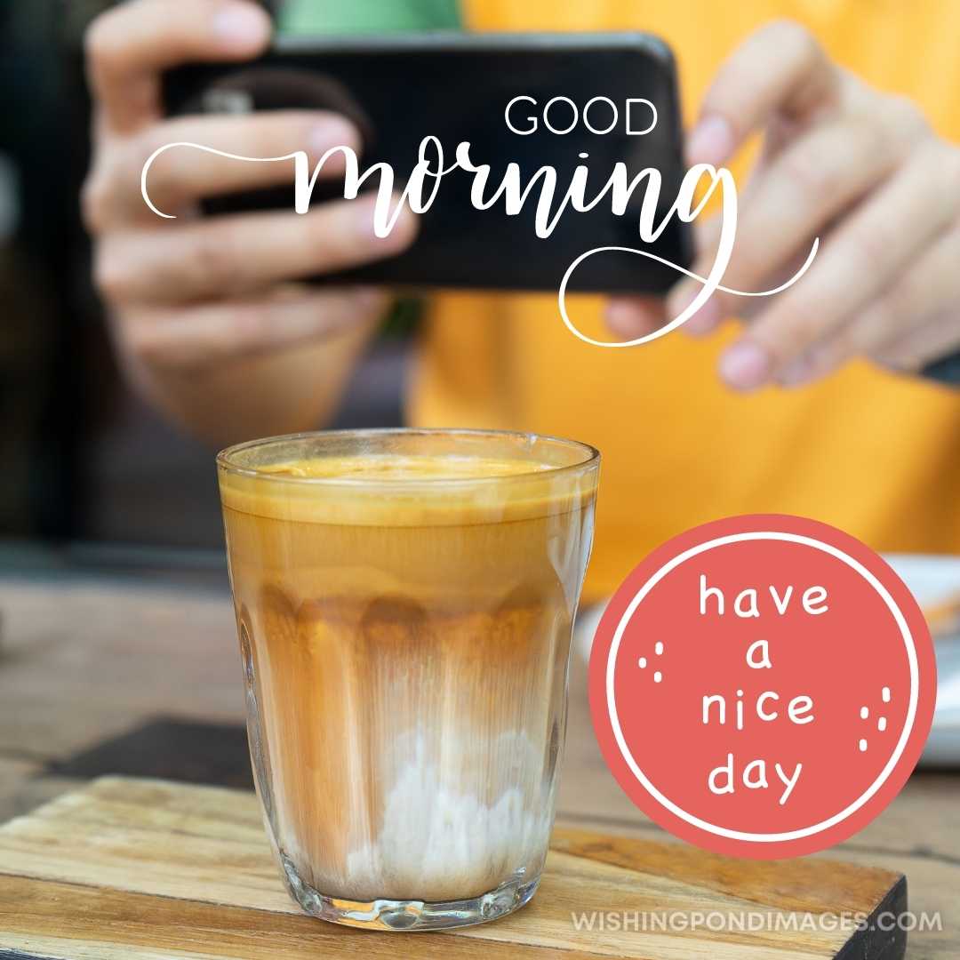 Hand of man take photo cold coffee drinks by smartphone. Good Morning Coffee Images